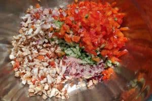 All the healthy ingredients diced to make a kidney bean tartar.