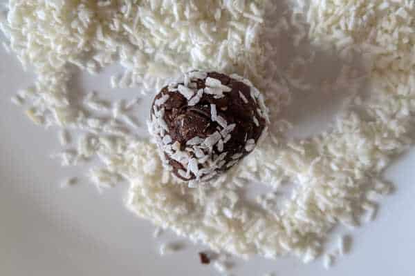 Hand shapped ball with grated coconut.