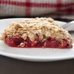 A serving of an apple and cranberry crumble.