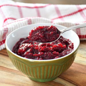 Cranberry sauce recipe presented in an old style bowl.