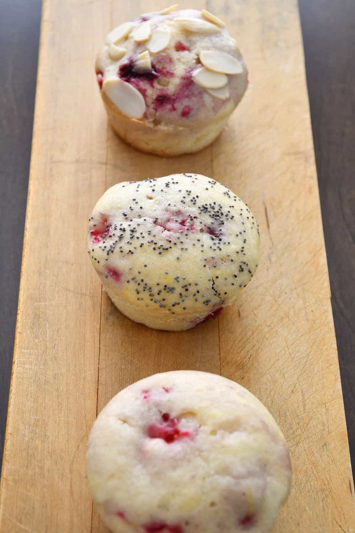 Three variations of toppings for the kidney friendly lemon raspberry muffin recipe (Nature, poppy seeds, sliced almonds).